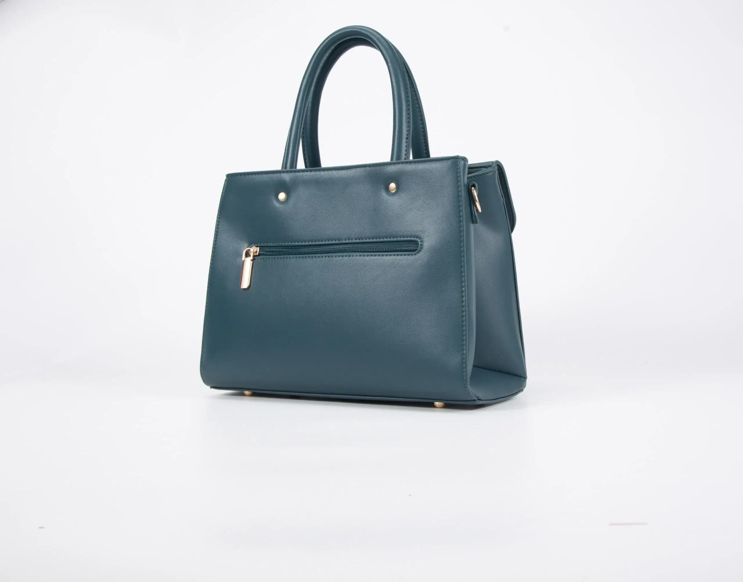 Set consisting of a medium-sized handbag with an elegant - Green
